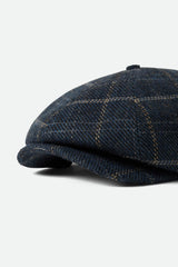 Unisex Brood Newsboy Cap in Mood Indigo/Tan