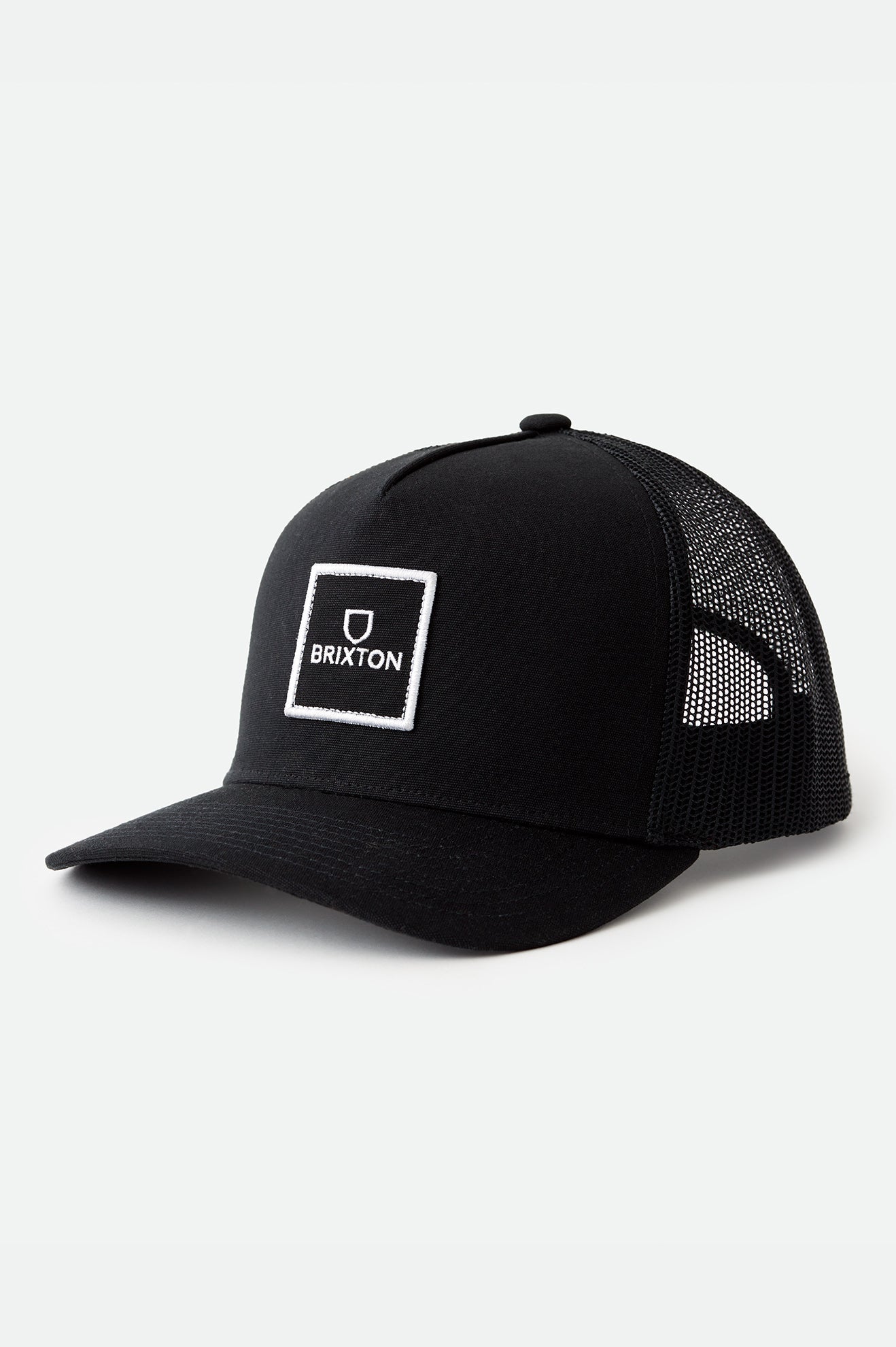 Unisex Alpha Block Netplus Trucker Hat in Black